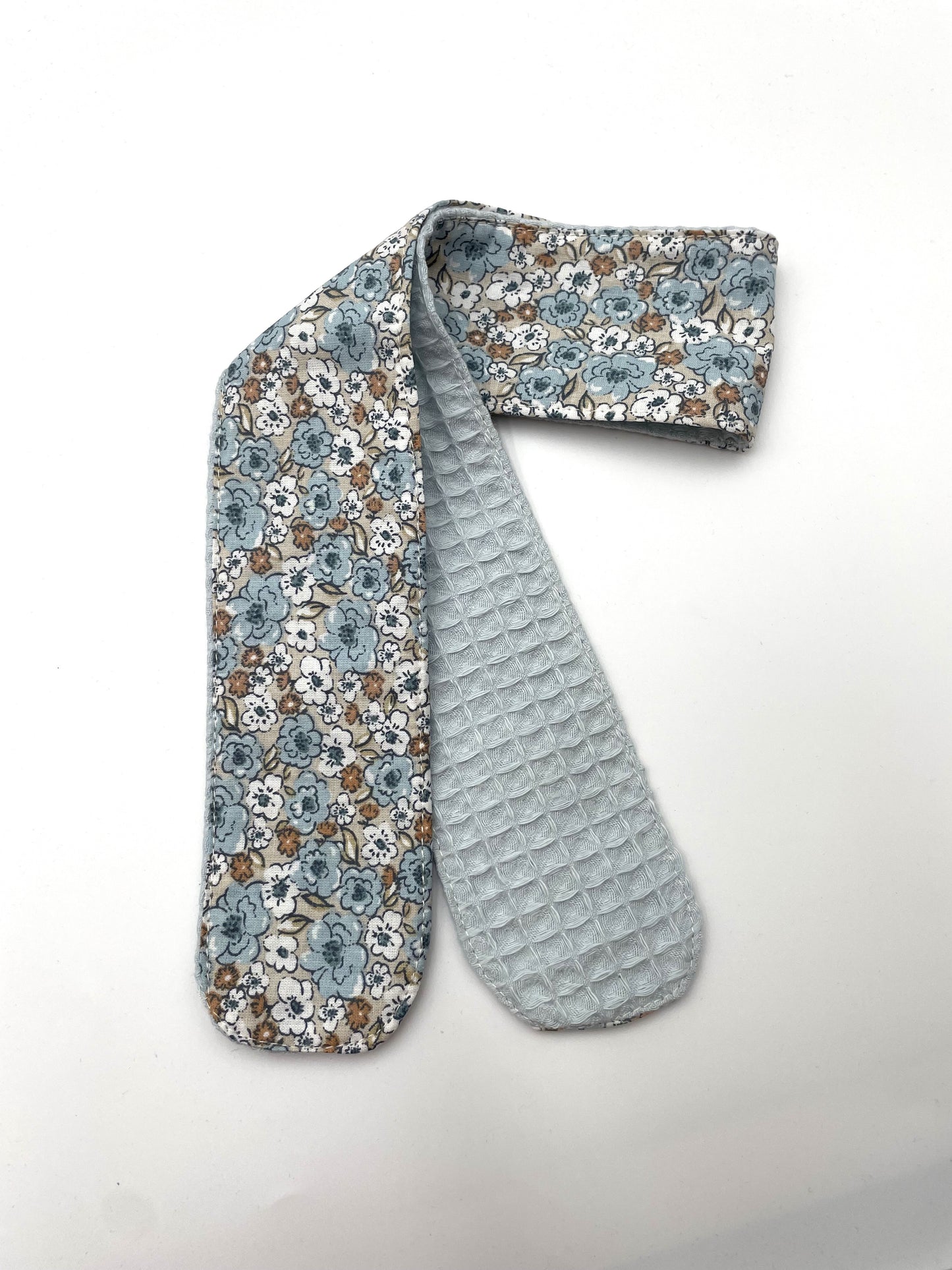Bandeau de soin - Fleurs bleues sur fond bleu Eponge ciel